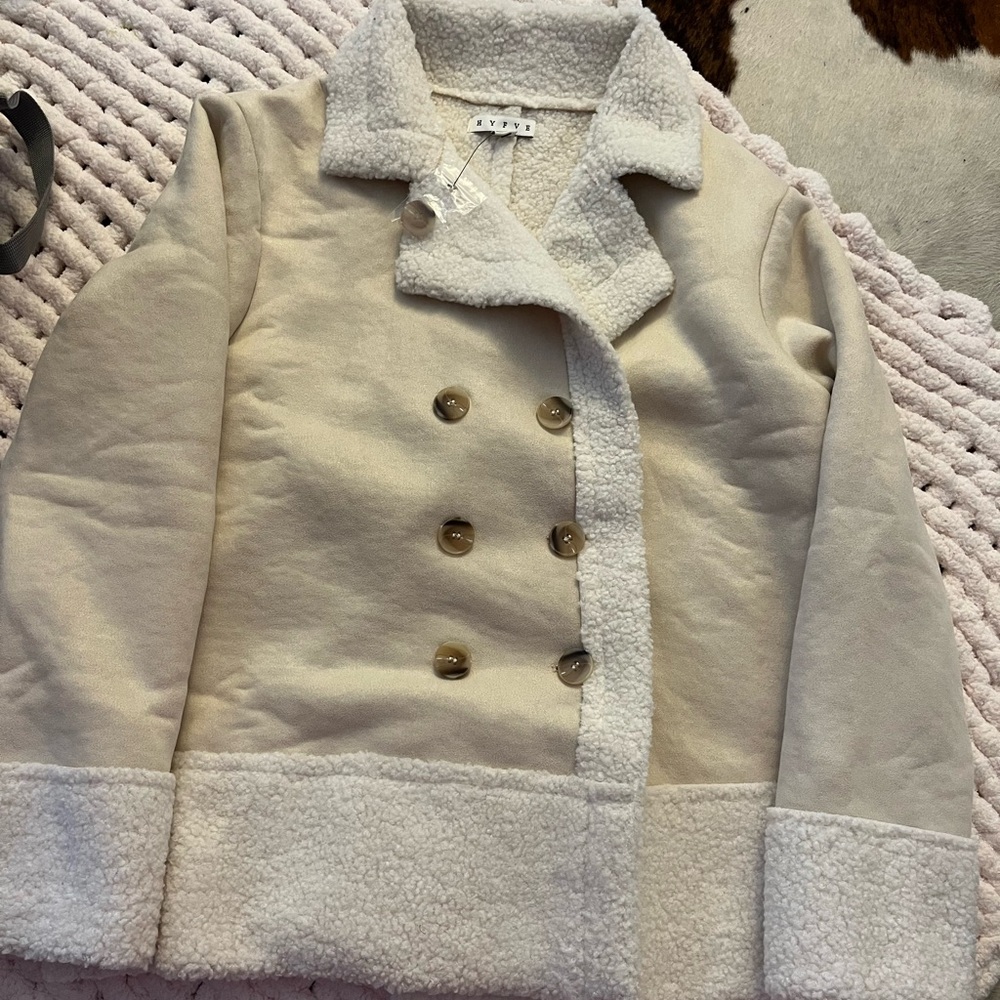 These Three coat